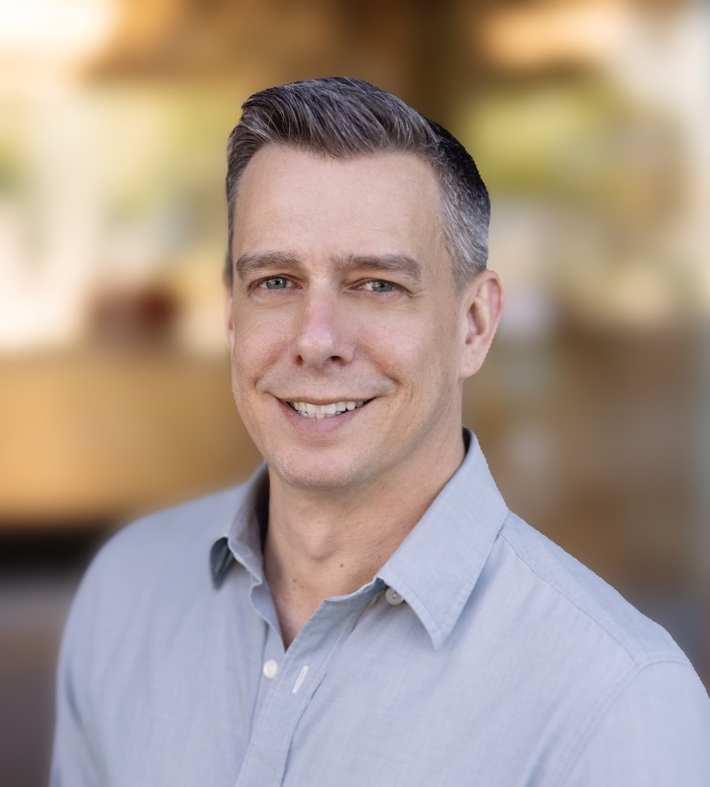 Portrait of Jonathan Larson, M.S., CFE, founder of Forward Intrinsic